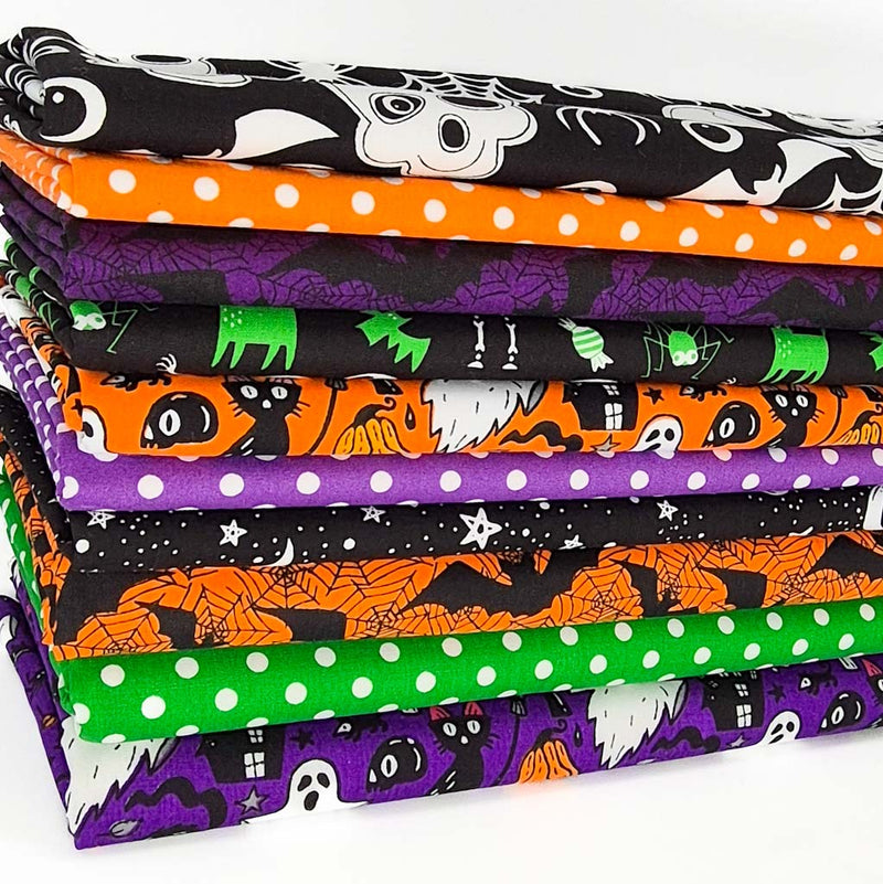 A fat quarter bundle of 10 halloween polycotton fabrics