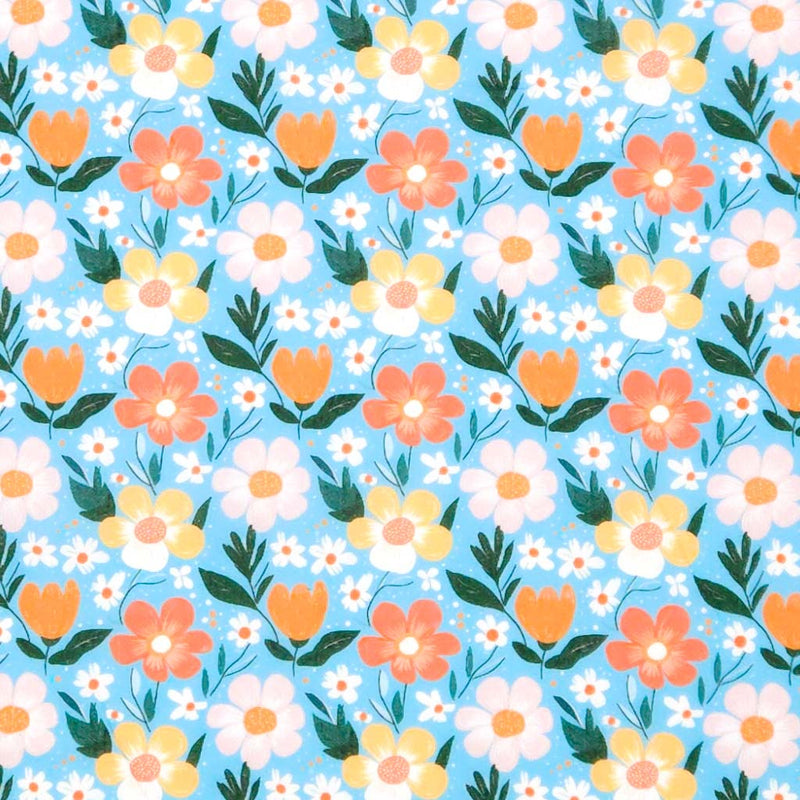 Floral pattern with orange, yellow, and white flowers on a blue polycotton fabric