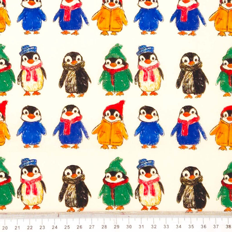 Pattern of cartoon penguins in colorful winter clothing with a ruler at the bottom.