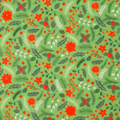 Christmas-themed pattern with red flowers, green leaves, and berries on a green polycotton fabric