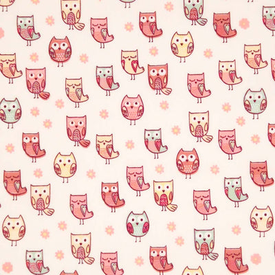 A cute owl and daisy design printed on a cream, 100% cotton poplin fabric.