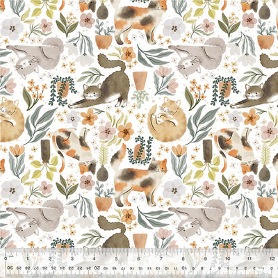 Cats and flowers printed on a cotton quilting fabric