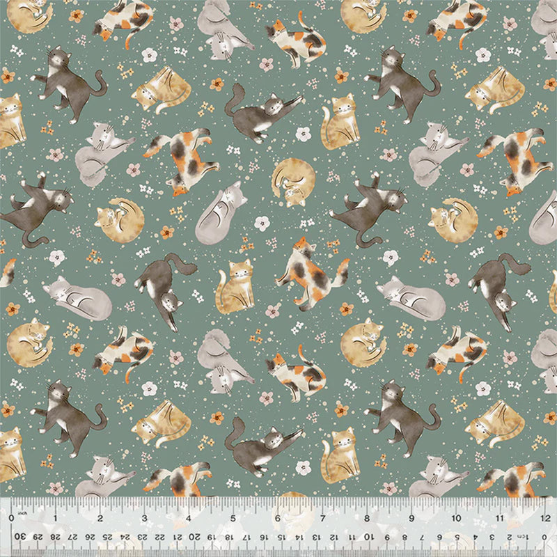 Cats and flowers printed on a dark duck egg cotton quilting fabric