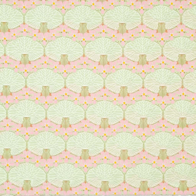 Mint coloured trees printed on a blush pink pima cotton lawn fabric