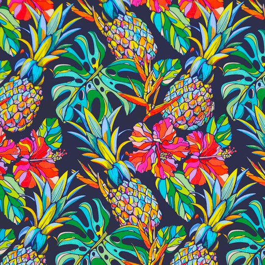 Pineapple and hibiscus printed on a navy cotton poplin fabric