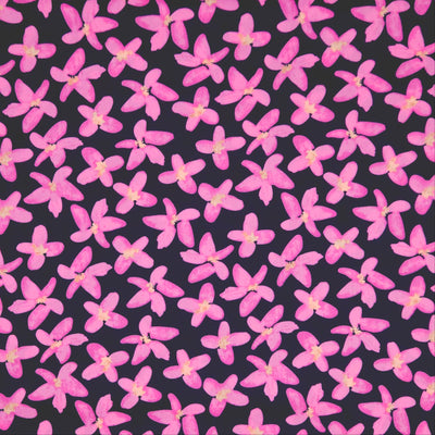 Pattern of pink flowers on a black pima cotton lawn fabric