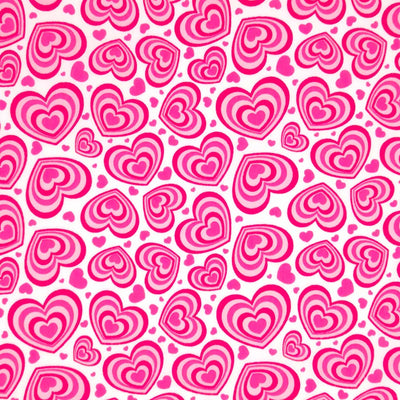 Pink concentric hearts printed on a white polycotton fabric