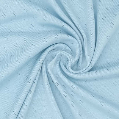 A pointelle stretch jersey fabric in sky blue