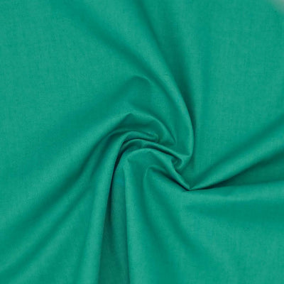 A plain, jade coloured polycotton fabric