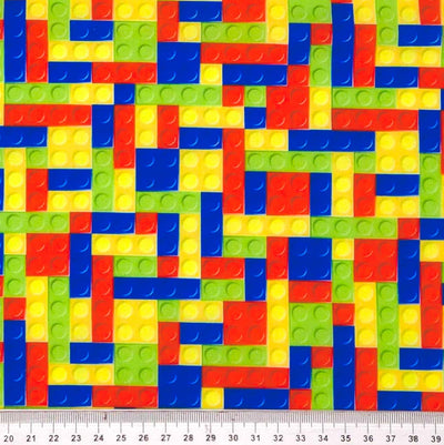 Colourful pattern of childrens building blocks printed on a polycotton fabric
