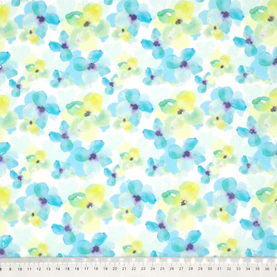 Watercolour pansies printed on a polycotton broderie anglaise with a cm ruler