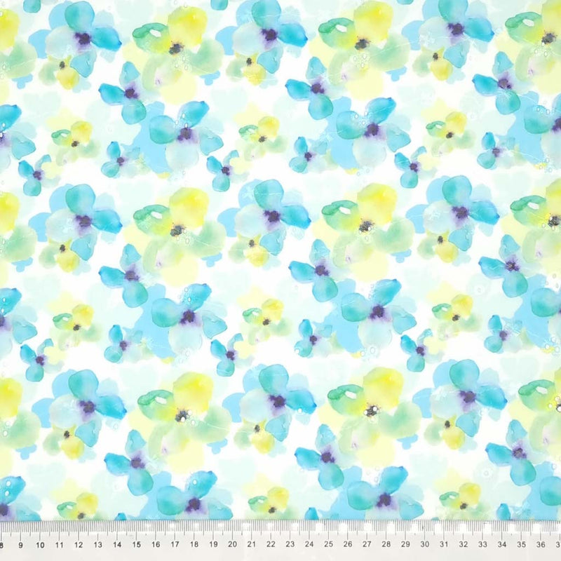 Watercolour pansies printed on a polycotton broderie anglaise with a cm ruler