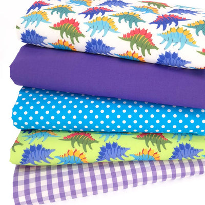 Dinosaur themed fat quarter bundle in purples and blues