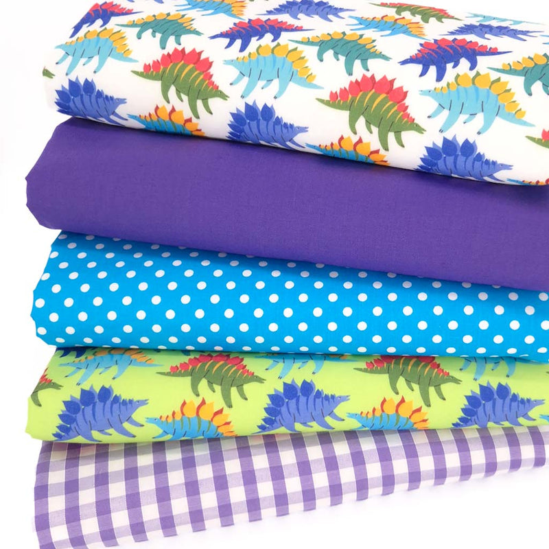 Dinosaur themed fat quarter bundle in purples and blues