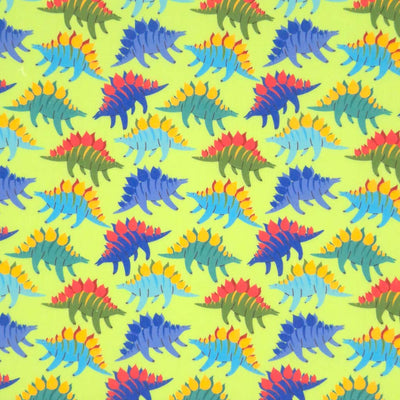 Bright blue and green dinos wearing contrasting yellow and red features on a lime green polycotton fabric