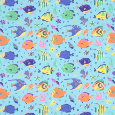 Tropical fish printed on a sky blue polycotton fabric