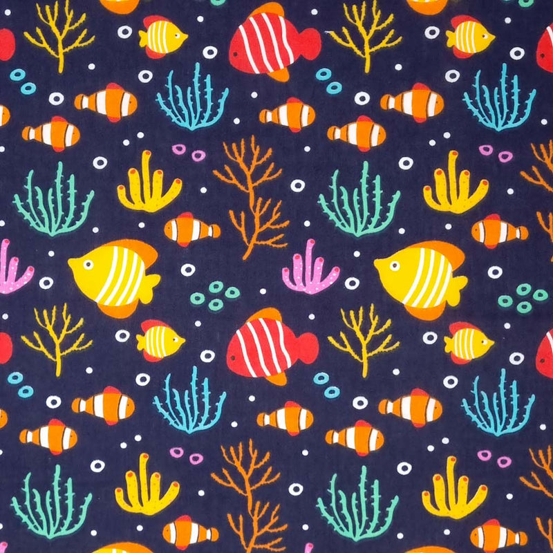 Brightly coloured fish are printed on a navy polycotton fabric