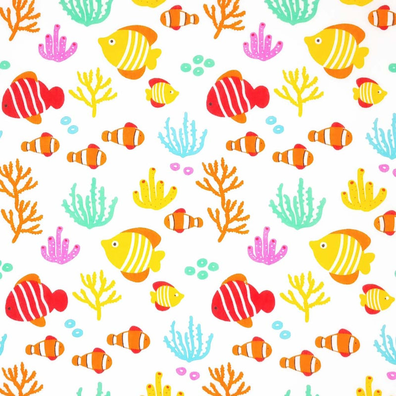Brightly coloured stripey fish are printed on a white polycotton fabric