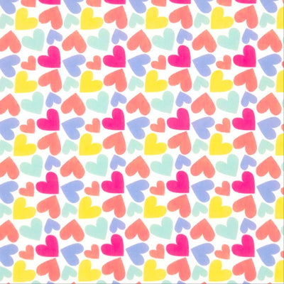 Coloured hearts printed on a white polycotton fabric