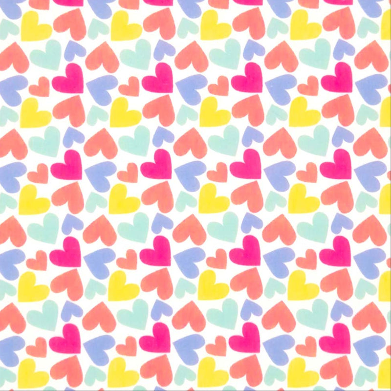 Coloured hearts printed on a white polycotton fabric