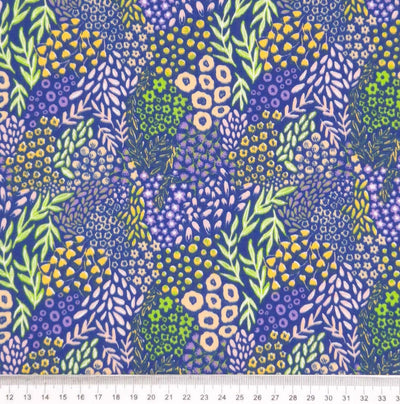 Bright plants of blue and white, alongside neon green vines on a contrasting purple polycotton fabric with a cm ruler