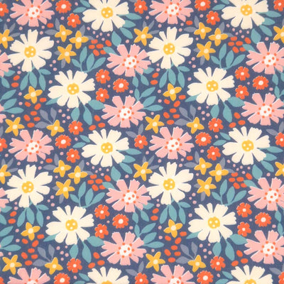Bold flowers printed on a blue polycotton fabric