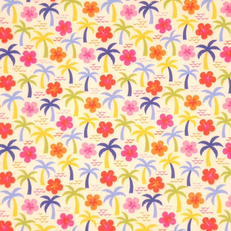Palm trees and hibiscus printed on a cream polycotton fabric