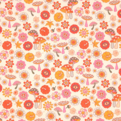 Mushrooms printed on a pale pink polycotton fabric