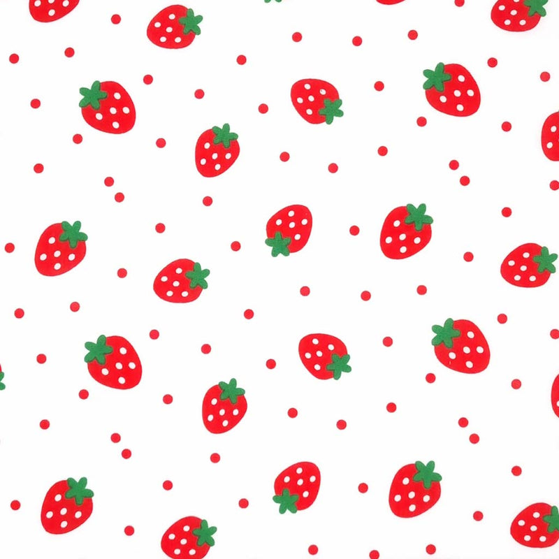 Spotty red strawberries with green stalks are printed on a white polycotton fabric with scattered red spots.