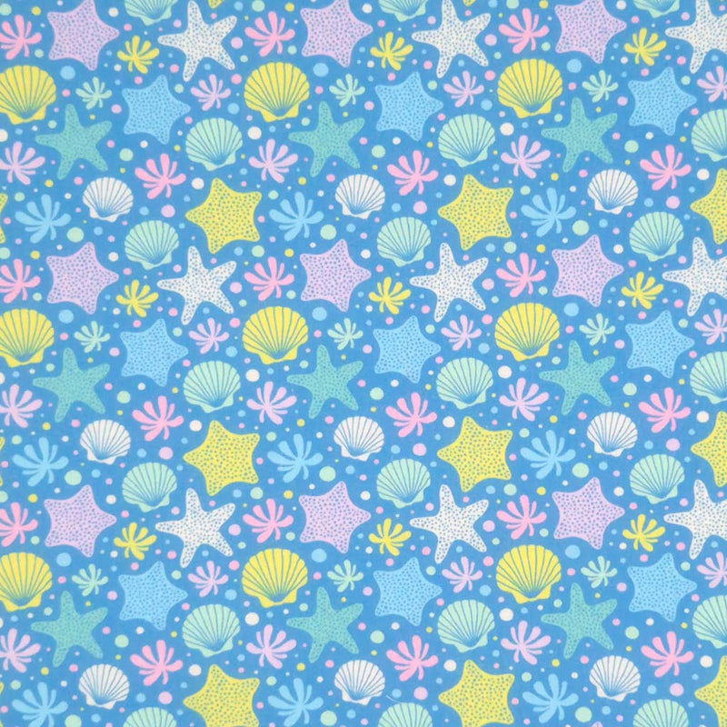 Starfish printed on a blue polycotton fabric