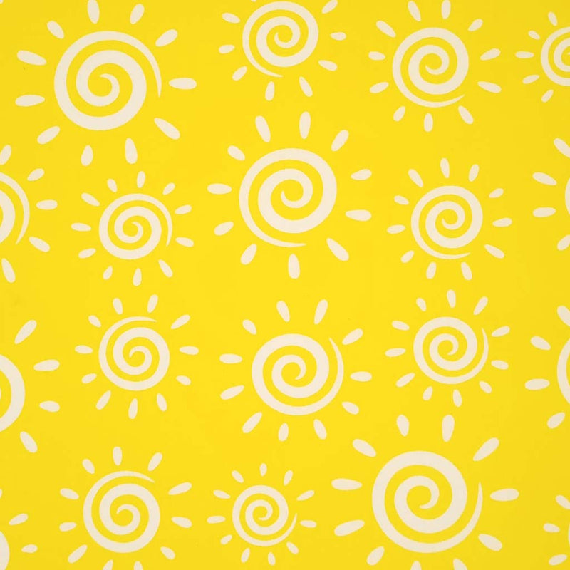 White swirly suns are printed on a yellow polycotton fabric