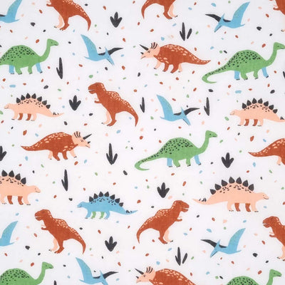 Green and brown dinosaurs printed on a white polycotton fabric
