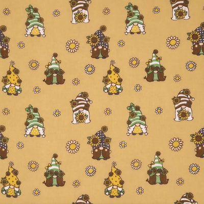 Cute little gonks with daisies are printed on a camel coloured polycotton fabric