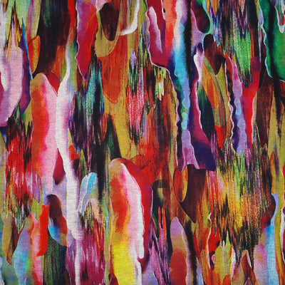 Rainbow coloured stripes are printed on a viscose ponteroma fabric