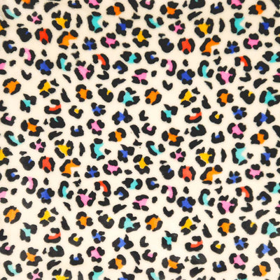 Colourful leopard print pattern on a beige fleece fabric