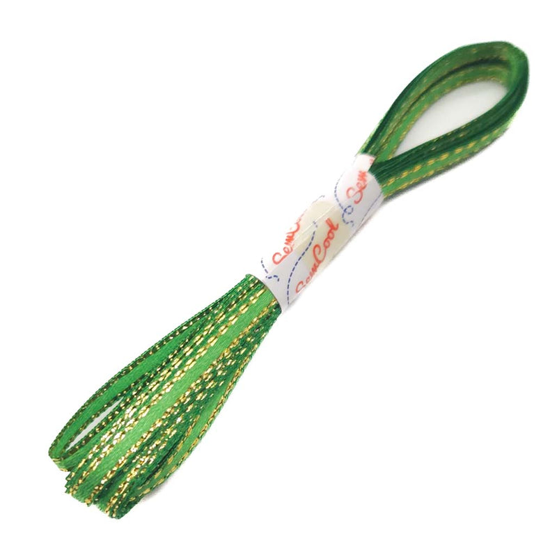 Green ribbon with gold thread on a white background