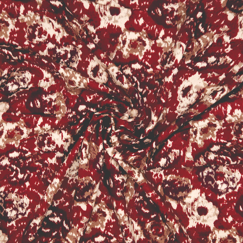 Close-up of a red and beige patterned fabric