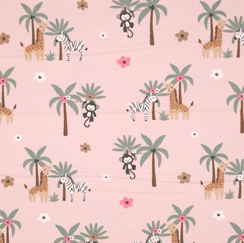 Monkeys and zebras printed on a pink cotton jersey fabric