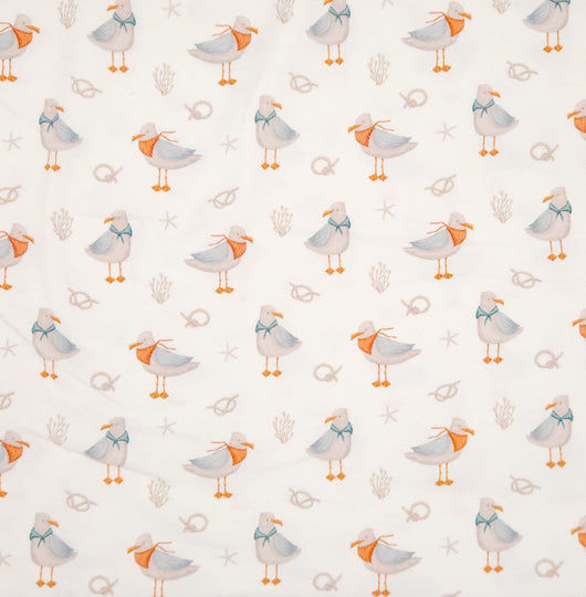 Seagulls printed on an ivory cotton jersey fabric