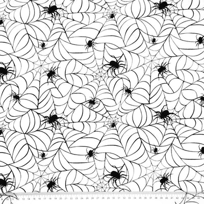 Pattern of black spiders and webs on a white background