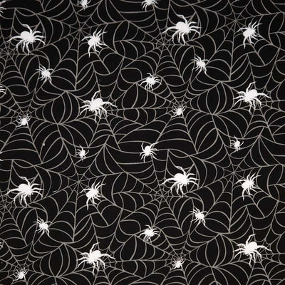 Pattern of white spiders and spider webs on a black polycotton fabric