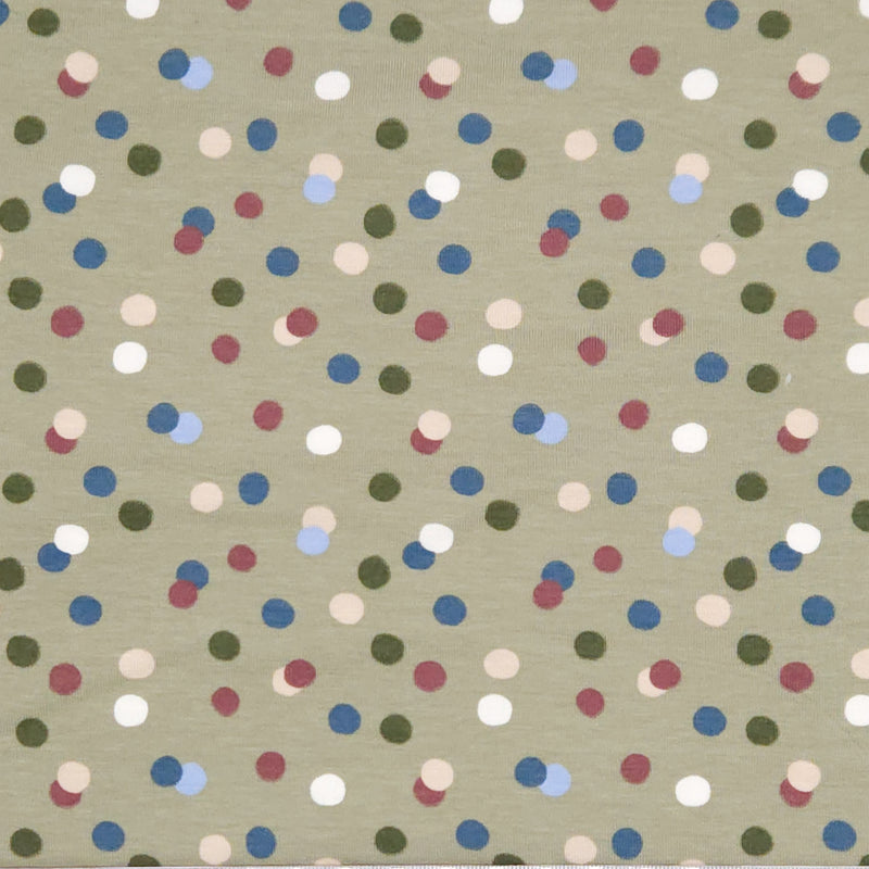 Dots printed on an olive green cotton jersey fabric