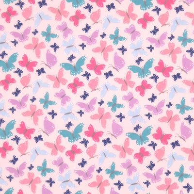 Butterflies printed on a pink polycotton fabric