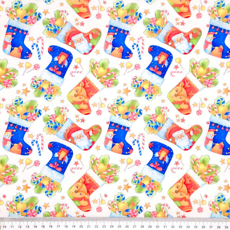 Pattern of colorful Christmas stockings with Santa Claus on a white polycotton fabric