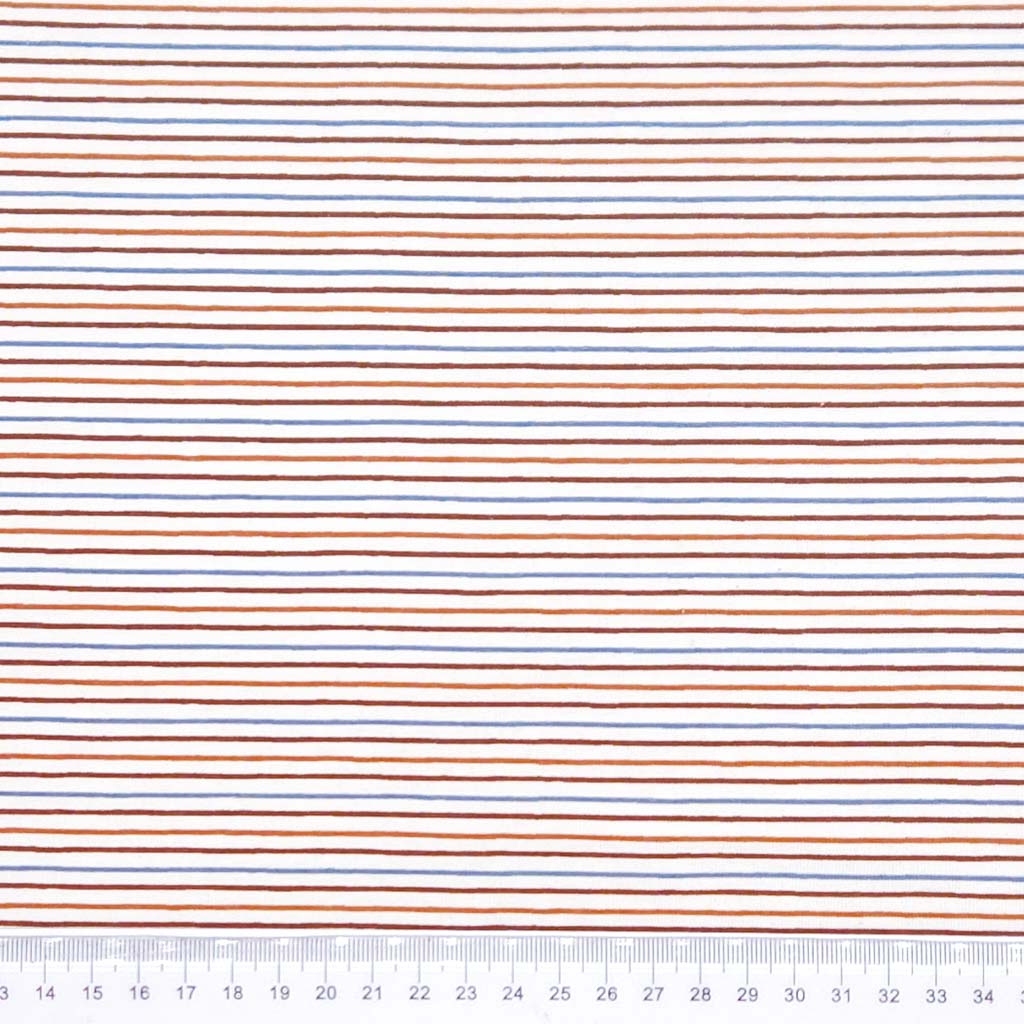 Brown and blue candy stripes printed on a cream jersey fabric with a cm ruler