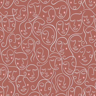 Day dreaming faces printed on a cinnamon cotton quilting fabric