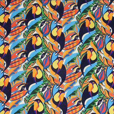 Toucans printed on colourful foliage. Cotton fabric design by Little Johnny