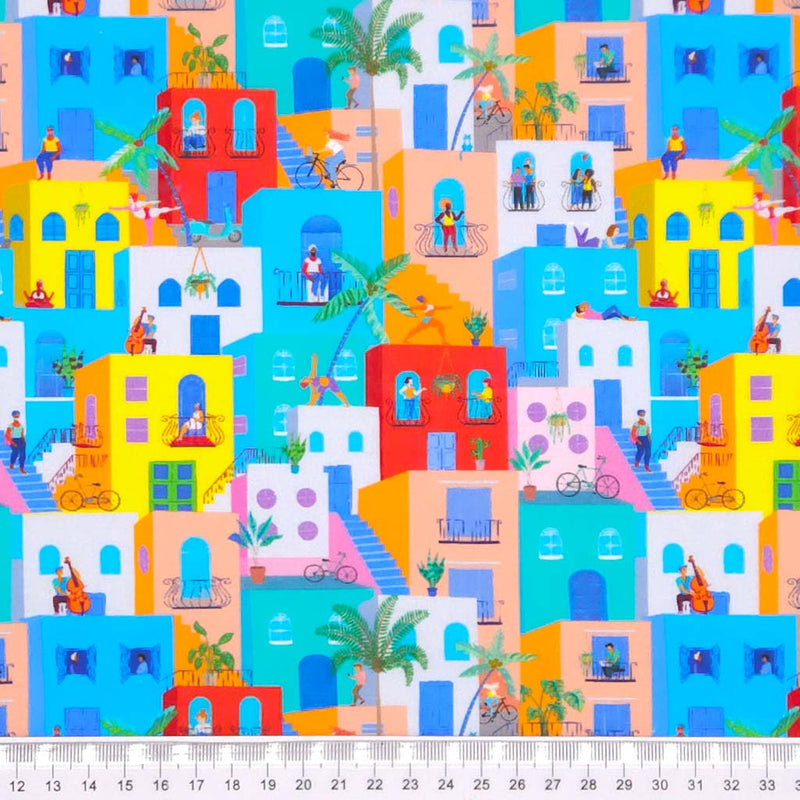 Coloured buildings printed on a cotton fabric by Little johnny with a cm ruler