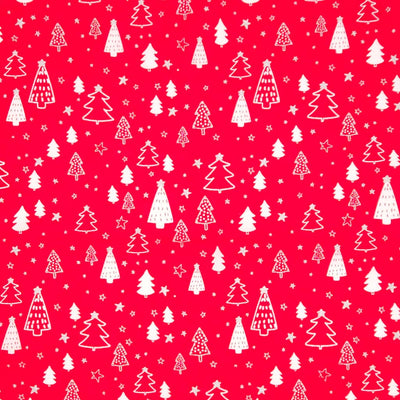 Pattern of white Christmas trees and stars on a red cotton fabric