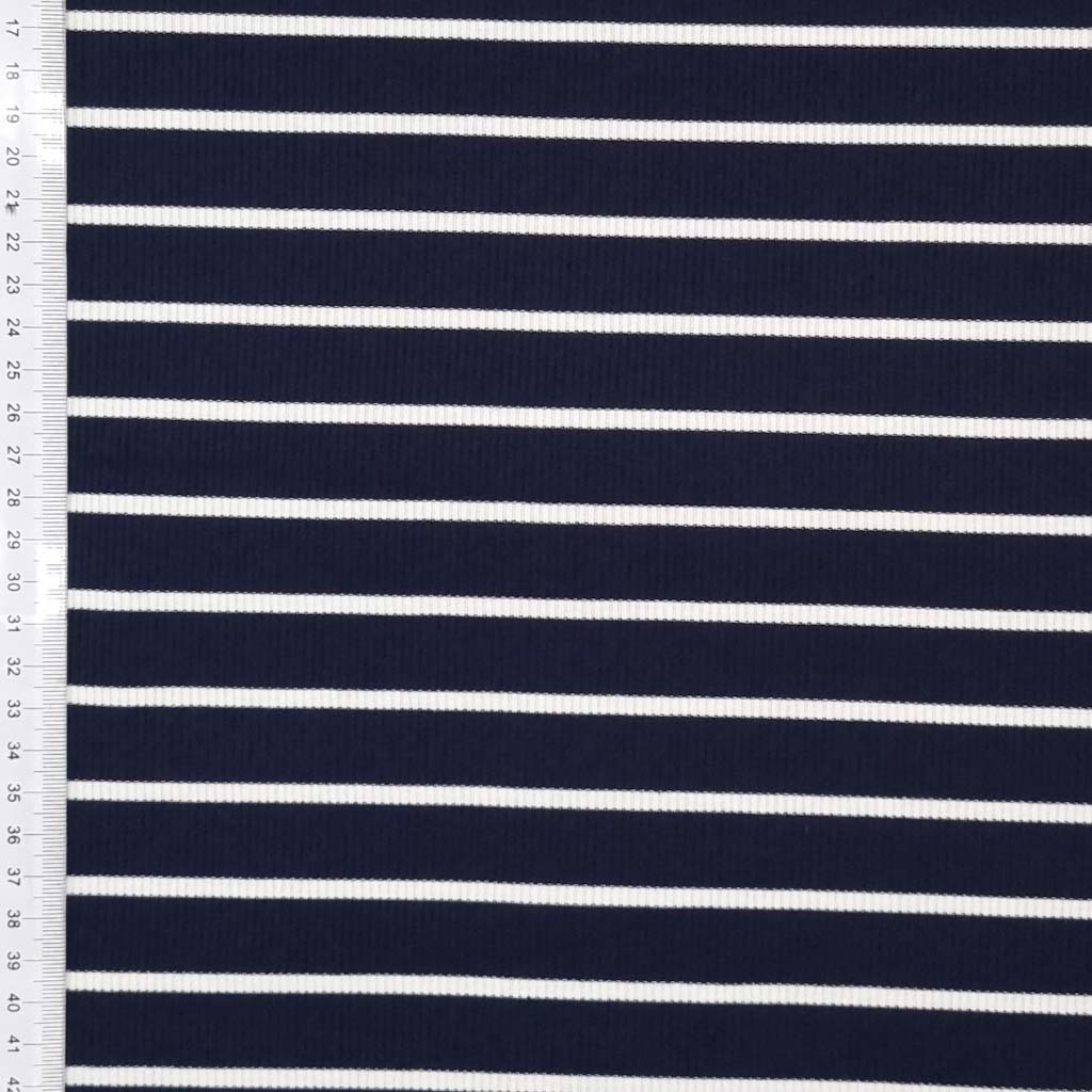 A navy ribbed viscose jersey fabric with white stripes with a cm ruler